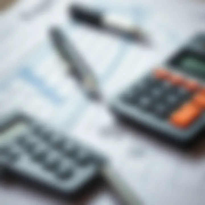 A calculator and financial documents illustrating budgeting for construction