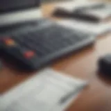A calculator and financial documents on a desk