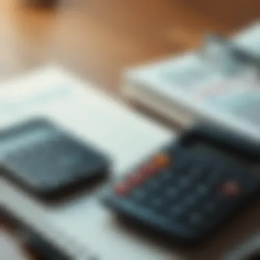 Budgeting for Loan Repayment A calculator and a notebook illustrating budgeting