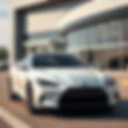 A sleek, modern car parked in front of a dealership